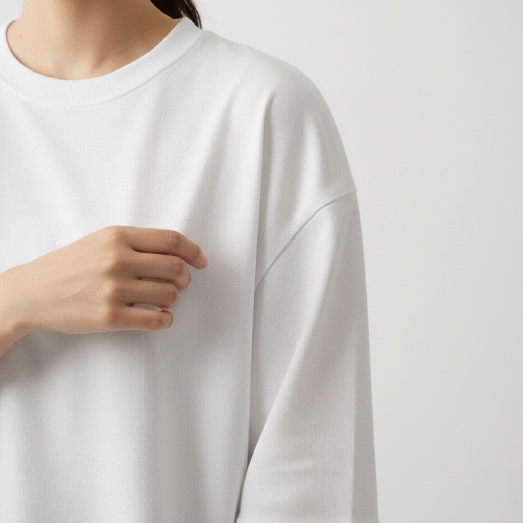 moleculuxe pristine White long-sleeve shirt worn by a person on a plain background